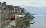 Re 460 Wintertime on the Lake of Geneva: Re 460 460 064-9 with an IR by St Saphorin.
20.01.2011