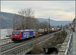 Re 482 Re 482 000-7 is hauling a goods train through Oberwesel on March 19th, 2010.