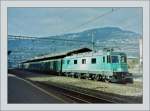 re-620-re-6-6 The SBB Re 6/6 11665 in the test SBB-Cargo color with a fast train in Vevey in the early 2000.