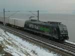 RTS On a dark fog day runs the RTS Re 185 along the lake of Geneva. 
(by Rivaz, 26.01.2007)