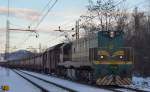 Diesel loc 644-018 is hauling freight train through Maribor-Tabor on the way to Tezno yard. /14.12.2012