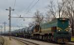 Diesel loc 664-106 pull tank train in Pragersko on the way to Hodo. /28.12.2012