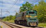 Diesel loc 664-106 is running through Maribor-Tabor on the way to Tezno yard. /31.7.2013