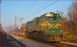 Diesel loc 664-111 is running through Maribor-Tabor on the way to Studenci station. /16.12.2013