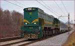 Diesel loc 664-102 is hauling MV247 'Citadella' through Maribor-Tabor on the way to Budapest. /7.1.2014