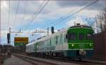 Multiple units 711-013 are running through Maribor-Tabor on the way to Maribor station. /28.2.2014
