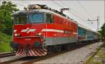 Electric loc 342-001 pull passenger train through Maribor-Tabor on the way to Maribor station. /24.7.2014