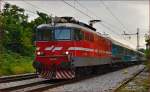 Electric loc 342-001 pull passenger train through Maribor-Tabor on the way to Maribor station. /22.9.2014