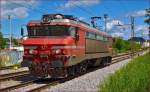Electric loc 363-018 is running through Maribor-Tabor on the way Tezno yard. /12.5.2014