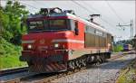 Electric loc 363-038 run through Maribor-Tabor on the way to Maribor station. /24.7.2014