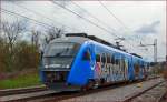 Multiple units 312-001 are running through Maribor-Tabor on the way to Maribor main station. /24.3.2014