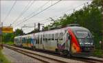 Multiple units 312-123run through Maribor-Tabor on the way to Maribor station. /3.9.2014