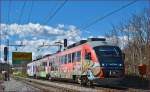 Multiple units 312-124 run through Maribor-Tabor on the way to Maribor station. /3.4.2015