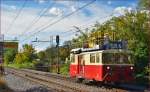 Maintenance unit 911-302 run through Maribor-Tabor on the way to Maribor station. /14.10.2014