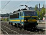 Serie 12 HLE 1202 is running alone through the station Antwerpen Nooderdokken on April 24th, 2010.