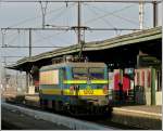 Serie 12 HLE 1202 is running alone through the station Gent Sint Pieters on November 12th, 2011.