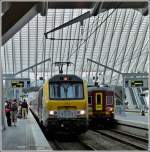 Serie 13 HLE 1341 is heading the IC A Eupen - Oostende in Li�ge Guillemins on July 23rd, 2011.