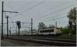 Serie 13 HLE 1337 is heading the IC A Eupen - Oostende in Oostende on October 9th, 2011.