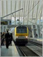 Serie 13 HLE 1334 with the IC A Eupen - Oostende is entering into the station Li�ge Guillemins on June 23rd, 2010.