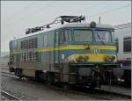Serie 15 1503 is standing in the rain on September 12th, 2008 at Gouvy.