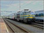 Serie 15 1503 is waiting with a P train at the station of Gouvy on September 14th, 2008.