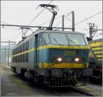 Serie 20 2010 pictured at Kinkempois on May 18th, 2008. These powerful engines were taken in operation by the SNCB between 1975 and 1977. They are used for heavy freight trains from the port of Antwerp, but also in international passenger traffic (line Brussels-Luxembourg). 