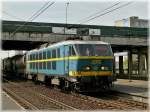 HLE 2013 is hauling a freight train through the station ...
