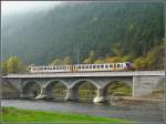 Serie 2000 A local train to Troisvierges is crossing the S�re bridge near Michelau on October 26th, 2008.