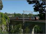 Serie 2000 Z 2001 is crossing the Bisserweg viaduct in Luxembourg City on August 1st, 2009.