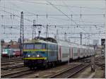 Serie 26 HLE 2627 is hauling a local train into the station Bruxelles Midi on February 6th, 2011.