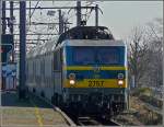 Serie 27 HLE 2757 with bilevel wagons is arriving at the station Gent Sint Pieters on February 14th, 2009. 