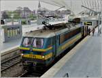 Serie 27 HLE 2745 with IC to Knokke or Blankenberge is waiting for passengers in Li�ge Guillemins on July 23rd, 2011.