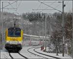 Serie 3000 3010 is running through Enscherange on a cold and snowy March 25th, 2008. 