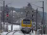 Serie 3000 3004 is pushing its train through the snowy landscape near Wilwerwiltz on December 21st, 2009.