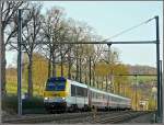 3016 is heading the IR Luxembourg-Liers between Colmar-Berg and Schieren ...