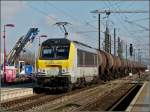 Serie 3000 3007 is hauling a freight train through the station of P�tange on February 8th, 2011.