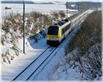 Serie 3000 3015 is heading the IR 114 Luxembourg City - Liers near Hautbellain just before arriving in Belgium on February 16th, 2010.