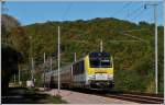 Serie 3000 3015 is heading the IR 117 Liers - Luxembourg City near Erpeldange/Ettelbr�ck on October 15th, 2011.