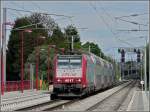 Serie 4000 4017 heading a push-pull train arrives at the stop Lamamdelaine on its way from Luxembourg City to Athus (B) on May 3rd, 2009.