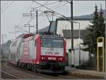 Serie 4000 4014 is pushing its train out of the station of Lintgen on February 18th, 2010.