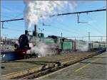 serie-64-p8 The PFT-TSP steam locomotive 64.169 (P 8) is leaving the station Gent Sint Pieters on February 14th, 2009.