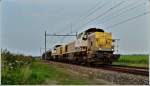Serie 77-78 HLD 7786 and 7869 are hauling a freight train near Zevenbergen on September 2nd, 2011.