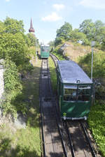 The funicular railway at Skansen in Stockholm. Since 1897, Skansen has been served by the Skansens Bergbana, a funicular railway on the northwest side of the Skansen hill. 
Date: 27. July 2017.