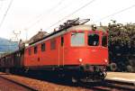 One of the first Re 4/4 In in Red. 
Re 4/4 I with a local train service in Grenchen Nord 
14.09.1984
(scanned analog photo)
