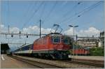 SBB Re 4/4 N 11154 with an RE in Renens (VD).
30.05.2012