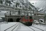 Two Re 4/4 are leaving the Gotthard Tunnel by Göschenen.
24. 01.2014