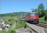 The SBB Re 4/4 II 11228 with a local train near Bossière.
25.05.2011