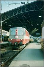 The Swiss Express Re 4/4 II 11103 in Lausanne.