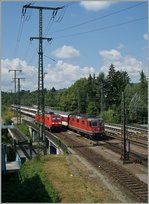 A SBB Re 4/4 II is arriving wth his IC to Stuttgart in Singen.