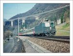 A analog picture with a SBB Re 4/4 II and his EC to Milano near Villeneujve. 
03/1994